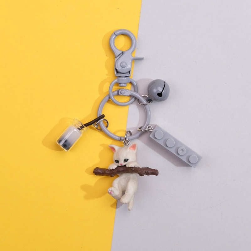 White Cat & Stick Keychain